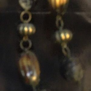 Long necklace . Wood and Goldtone beads